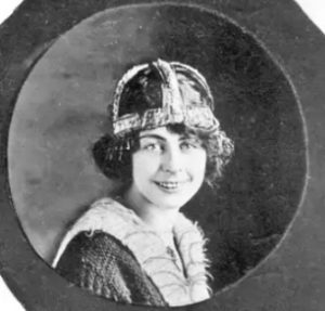 Miss Debora DeCostello, aeronaut, died in Empire after her parachute dropped over Lake Michigan instead of dry land in 1920. This photo is from Ancestry.com which says she lived from 1893-1920 which would make her 27. Another source called her 17 but either way, too young to be walking on the wings of airplanes.