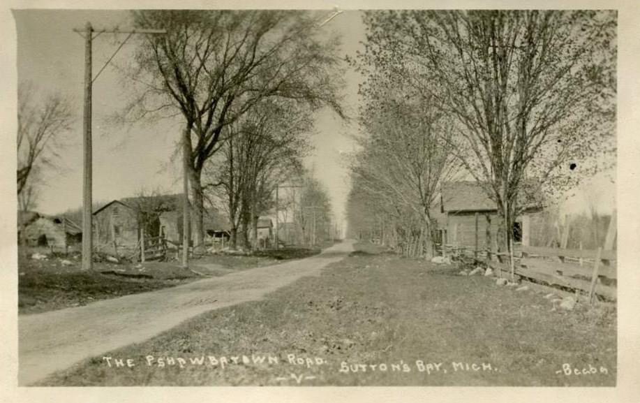 Early photo of the main road in Peshawbestown. There are many spellings of this little village. Courtesy Weengush Odeimin