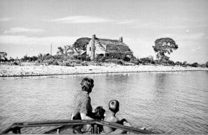 This photo is from a post card and the people are unknown, but suggest what the children, Jane Basler and Bob Reed, saw as they approached Gull Island. Courtesy Omena Historical Society