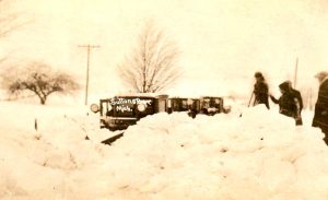 1912 Snowplow buried in Snow in Suttons Bay