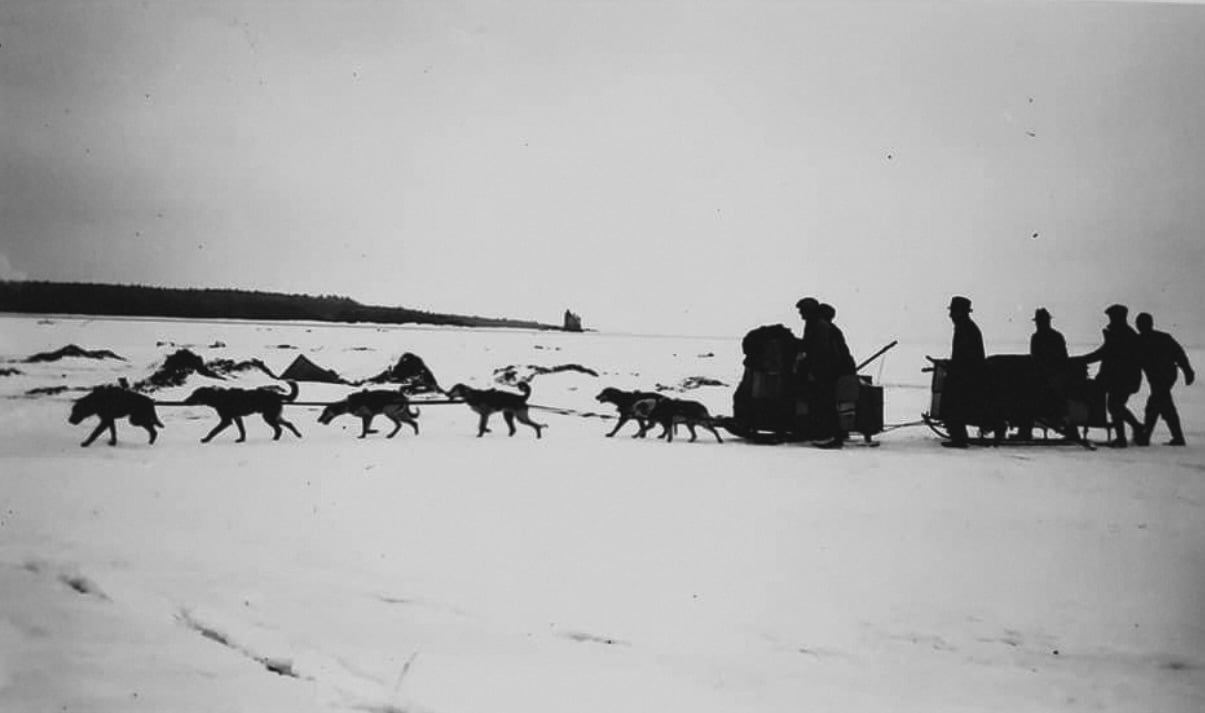 Dog sleds on their way to Mackinac.