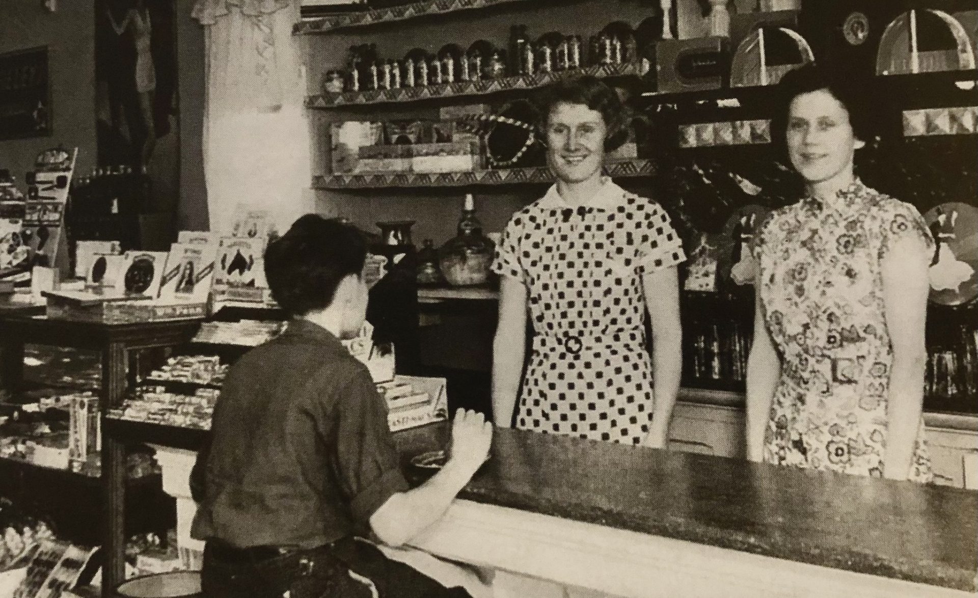 Gordon Solle, Elsie, and Geneva (Putnam) Smith at the counter in Anderson's Ice Cream Parlor in 1935