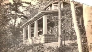 The Legg Cottage, perched on a hill overlooking Omena Bay. - Courtesy Omena Historical Society