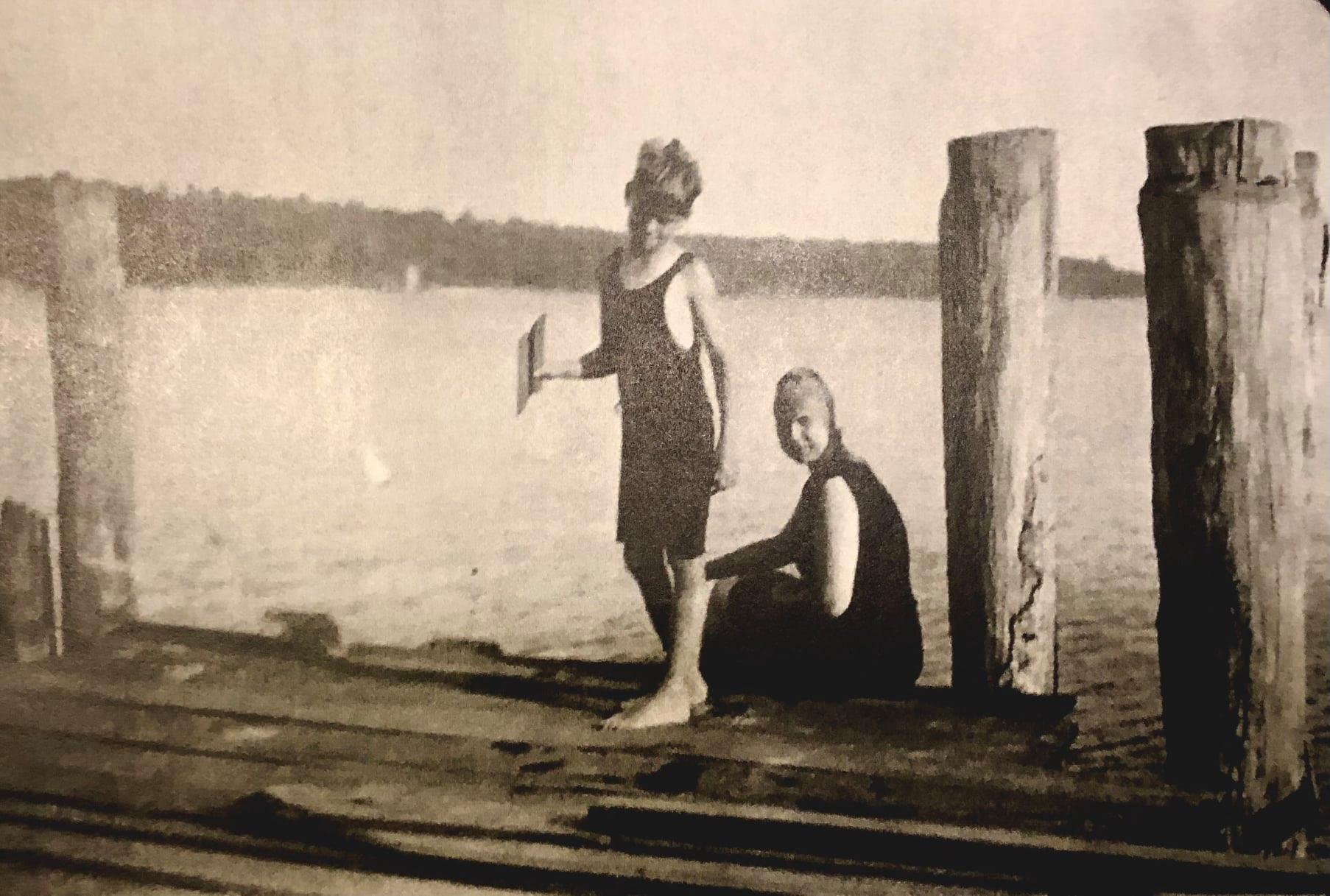 This photo is labeled "Stan BAM". "Omena Dock". Photo credit Omena Historical Society Stan (Stanley) Moore and Blanche Anderson Moore (BAM or Bamboo) are likely candidates.