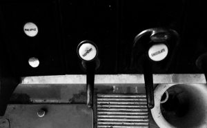 The syrup dispensers feature Strawberry, Raspberry, chocolate, and pineapple labels.