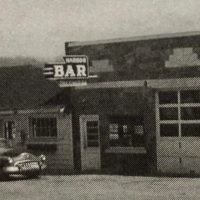 Putnam's Gas Station with several additions ca. 1950 - Courtesy of Ed and Caroline Oberndorf and Omena Historical Society Putnam's Gas Station