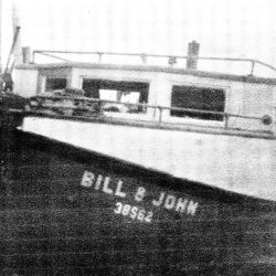 This is their second boat, built by Bill. He first made a small scale model, then built the large boat without any power tools according to his niece. He named it ‘Eclipse’, but they called it simply Bill and John. It was eventually sold to the Jesuits at Villa Marquette who gave John a certificate ensuring him he would always remain a member of the crew as long as the boat rode the waters of Omena and Grand Traverse Bay. This is their second boat, built by Bill. He first made a small scale model, then built the large boat without any power tools according to his niece. He named it ‘Eclipse’, but they called it simply Bill and John. It was eventually sold to the Jesuits at Villa Marquette who gave John a certificate ensuring him he would always remain a member of the crew as long as the boat rode the waters of Omena and Grand Traverse Bay.