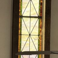 The stained-glass window rescued from the old Methodist Church in Northport and stored in a farmer friend's barn for years. Judy Mastick restored it by combining two windows into one. The stained-glass window rescued from the old Methodist Church in Northport and stored in a farmer friend's barn for years. Judy Mastick restored it by combining two windows into one.